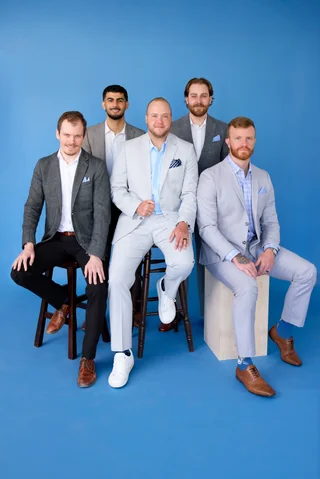 Noulty Financial advisors seated together